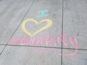 i heart my library in chalk on the pavement