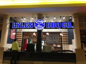 lexington restaurant: mall food court restaurant that says lyles bbq in blue