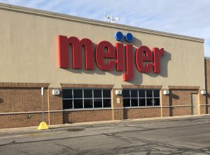 Thanksgiving: beige building with meijer in red
