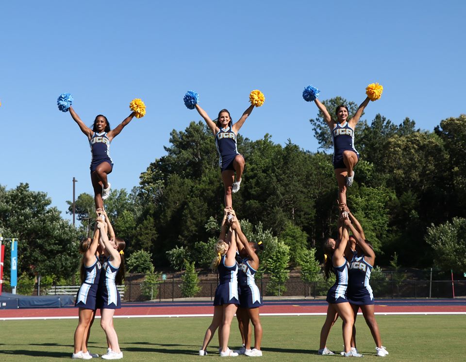 Group of cheerleader s doing a stunt